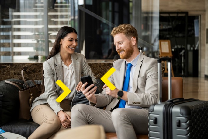 Man and woman using mobile banking on their phones